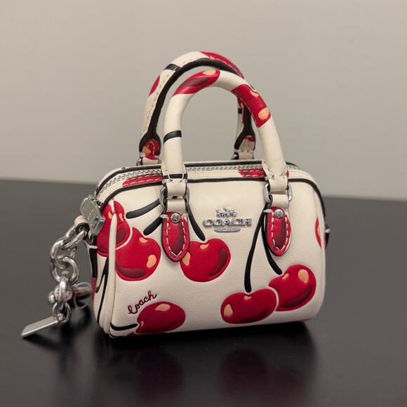 Coach CZ082 Mini Rowan Bag Charm With Cherry Print In Silver/Chalk Multi - Picture 2 of 6